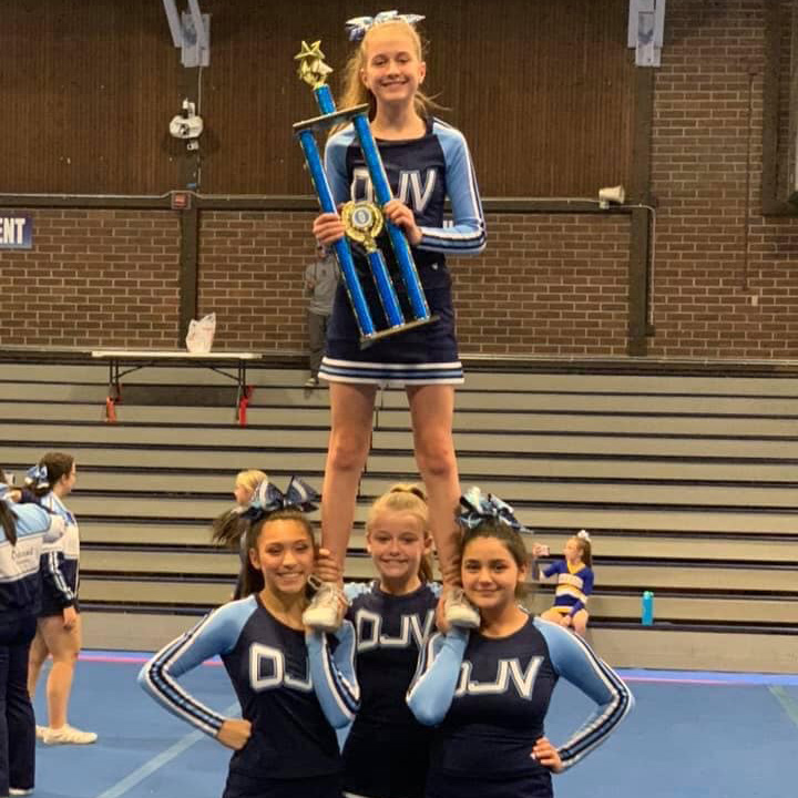 Sydney and her teammates at OJV Cheer competition